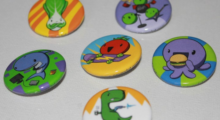 A photo of the first set of Never Spots pins